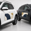 Custom rectangular vehicle door magnets on white and charcoal vehicles
