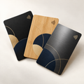 Custom NFC business cards in matte black, bamboo, and brushed metal